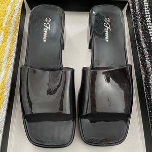 Black jelly block heels